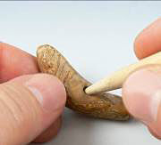Clay toggle being shaped